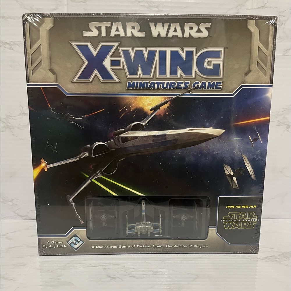 Star Wars X-Wing Miniatures Game Box with Blue and Black Design